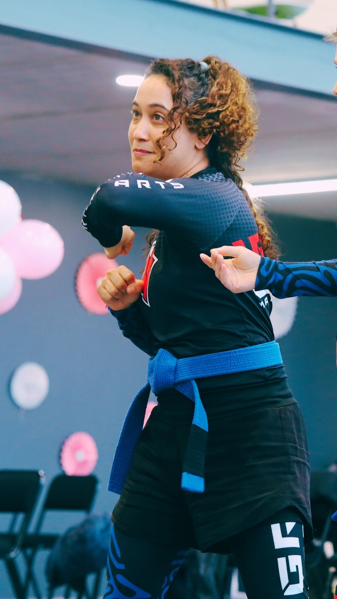 Lynn-Joy demonstrating a practical self-defence movement at Iron Grip